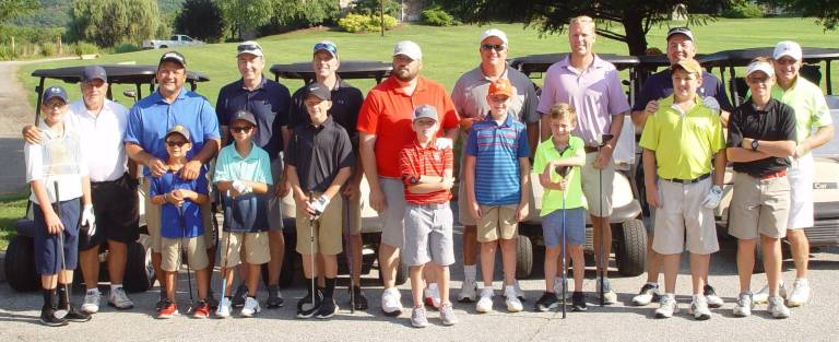 [Parents and their children are ready to compete in the Mid-Summer Golf Classic at the Crystal][Springs Resort’s Minerals Golf Club]