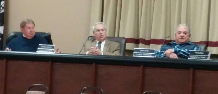 Councilman Patrick Rizzuto speaks during Monday's Meeting. He is flanked by Councilman Dick Wetzel, left, and Council President Dan Kadish, right.