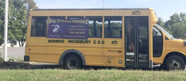 A Monroe-Woodbury school bus advertising a help wanted ad for bus drivers. Photo by Hanna Wickes.
