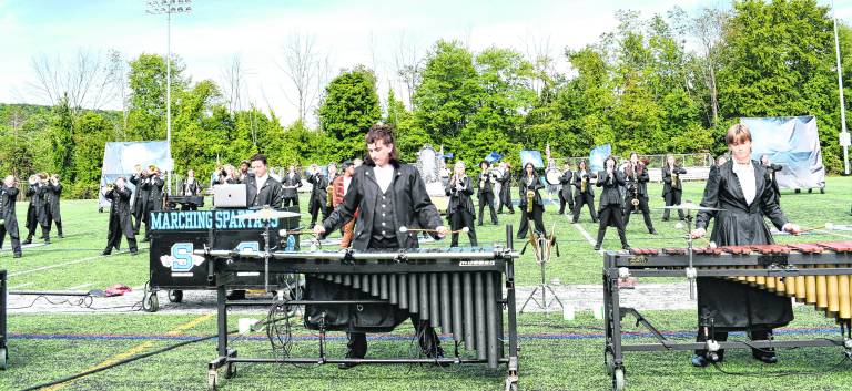 The Marching Spartans of Sparta High School perform.