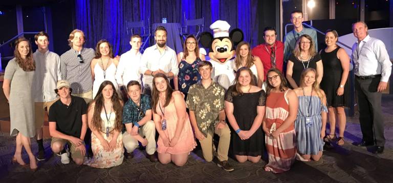 Students in the VTHS Future Business Leaders of America club traveled to DisneyWorld in Florida to get behind-the-scenes, real-world exposure to the world of hospitality and tourism. They met celebrity chef Fabio Viviani, pictured here, as one Vernon food truck team captured third place in a culinary contest.