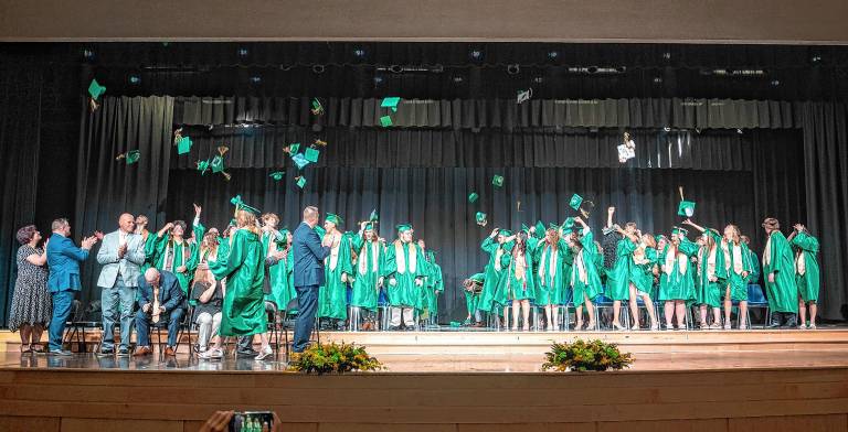 Sussex County Technical School graduates toss their caps at the end of graduation Wednesday, June 18. (Photos by Nancy Madacsi)