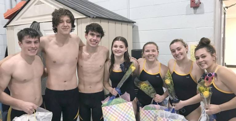 Members of the swimming team were honored on Senior Night.