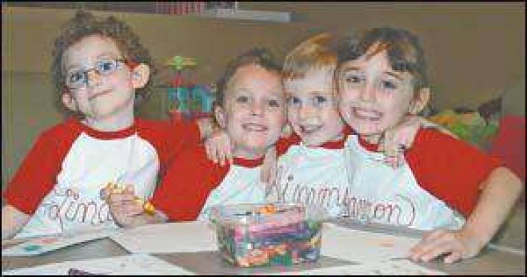 A day in the life of the Burke family - Quadruplets, now 5, go to kindergarten