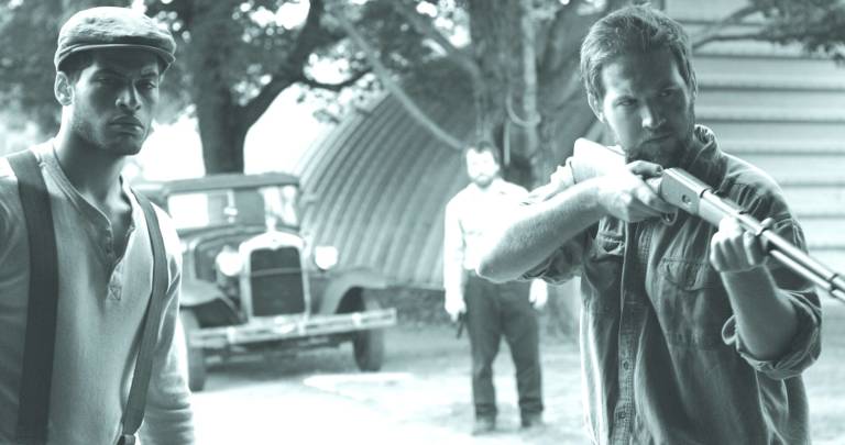 High Point Regional High School graduate Ryan Geiger pictured on right portraying lead role Patrick with Micaiah Castro playing Jeffrey on the left and in the background is Michael Jefferson, who plays Neil. The three are about the enter the garage where they have captured a zombie boy.