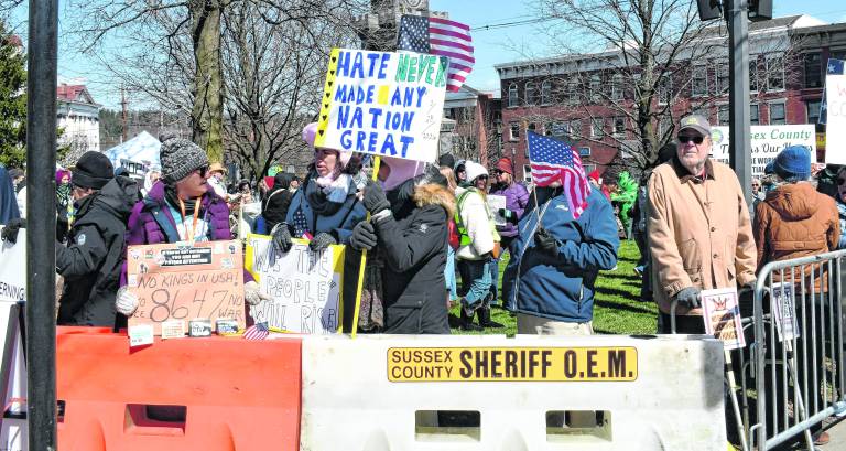 About 500-600 people turned out to protest the policies of President Donald Trump at a No Kings Rally at the Newton Green on Saturday.