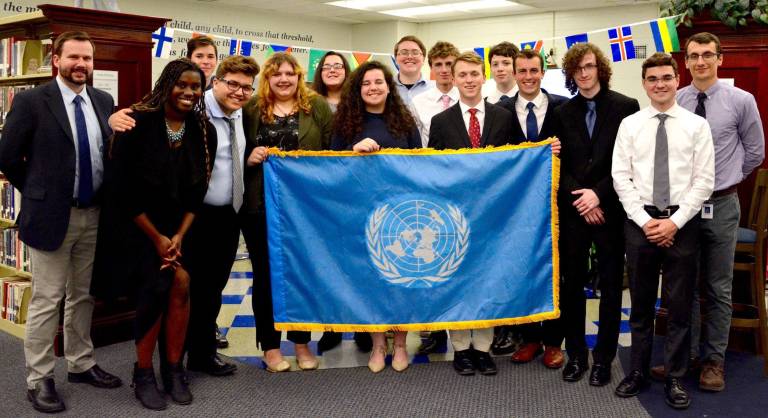 The VTHS Model UN team (l to r): Mr. Matt Trokan, Tyra Culpepper, Max Yacun, Dylan Shack, Zoe Heath, Gianna DeRose, Ciara Clarkin, Sam Dupont, Chris Ruiz, Jameson Parker, Jack Lowery, DJ McQuillan, Christian Fieldhouse, Dan McKeon and Mr. Kelsey Falkowski.