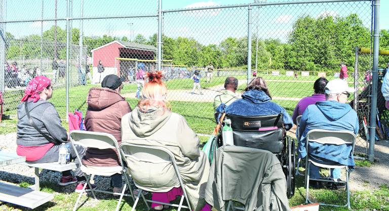 <b>Seniors watch the game.</b>