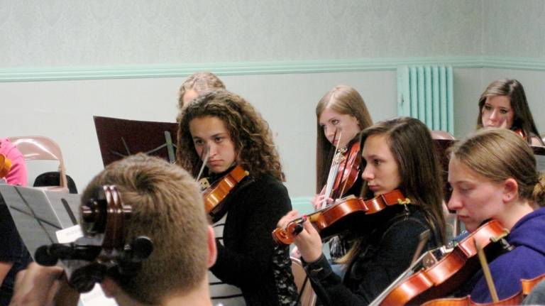 Vernon Township High School Orchestra receive tips from conductors in Boston.