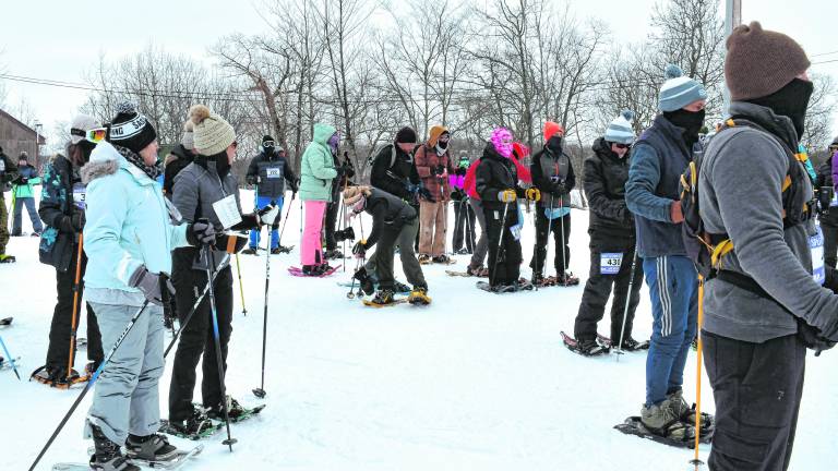 <b>Snowshoers are ready at the start of the event.</b>