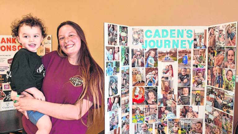 <b>McKenzie and Caden Dunn pose for a photo.</b>