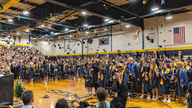 <b>Members of the Vernon Township High School Class of 2025 toss their caps in the air at the end of graduation Thursday, June 19. (Photos by Cody Williams)</b>