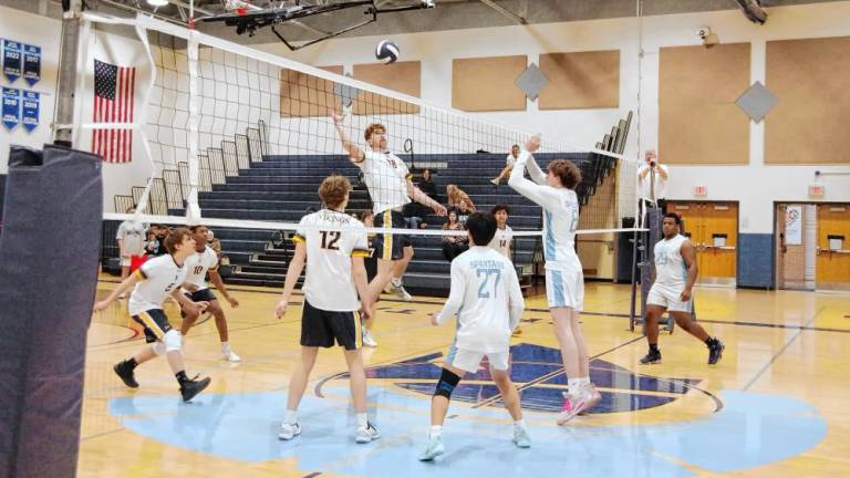 Vernon's Ben Jurewicz reaches for the ball in the game against Sparta on Thursday, April 18. The Vikings won 25-14, 25-14. (Photos by George Leroy Hunter)