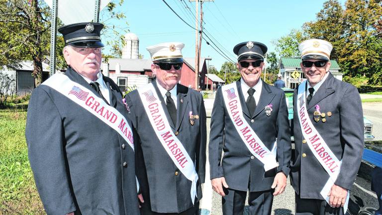 <b>Steve Funnell, Grant Rome, and Michael and Lou Cecchini of the Sussex Fire Dept. were the grand marshals.</b>