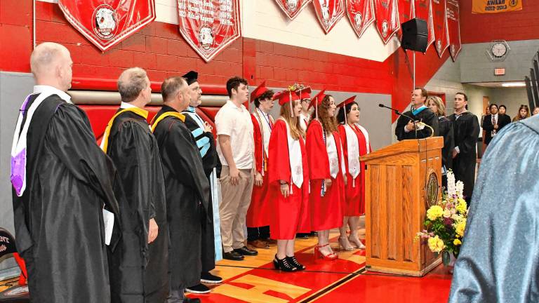 Senior members of the Chamber Singers sing the National Anthem at the High Point Regional High School graduation Wednesday, June 18. (Photos by Maria Kovic)