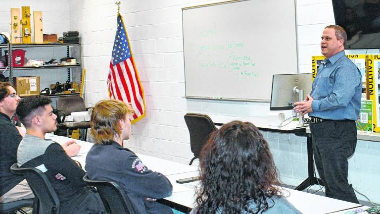 <b>Newton Town Manager gives a speech.</b>