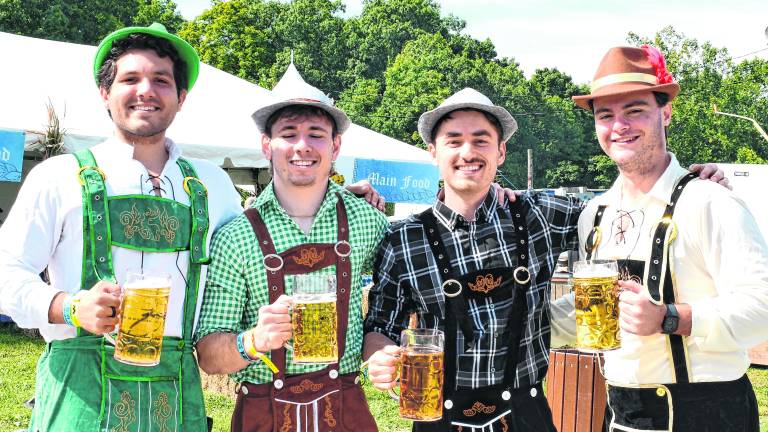<b>Luke Pascarella of Millstone, Bobby Hunter of Monroe, Nolan Shade of Vernon and Nick Cavallero of Howell pose for a photo in costume.</b>