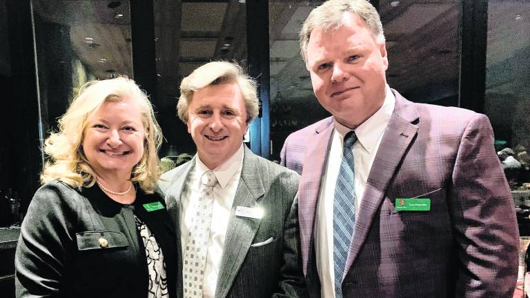 <b>Kathy Esposito, Ed DiTomasso, and Lou Esposito at a recent Open that Bottle Night celebration at the Hudson Farm Club.</b>