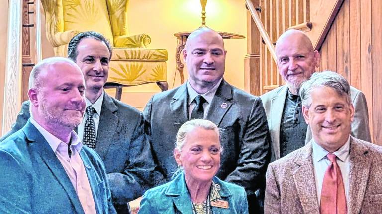 <i><b>At the luncheon, the award was received on behalf of the College by SCCC representatives. This group included Top Row, left to right: Business &amp; Economics Professor Sal Paolucci, Director of the Public Safety Training Academy John Dixon, and SCCC Trustee Chair Herb Yardley. First Row, left to right: Dean of Technical Occupations Jason Fruge, Vice President of Finance and Administrative Services Terry Pappan, and Executive Foundation Director Stan Kula.</b></i>