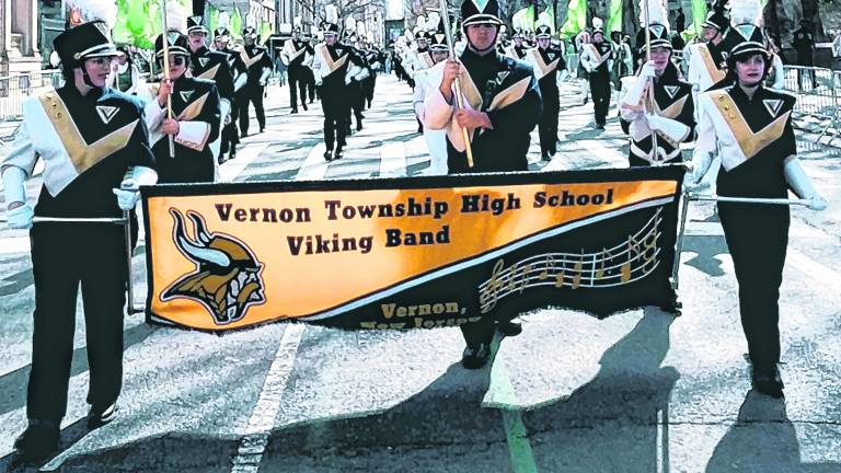 <b>The Vernon Township High School Marching band performs in New York City.</b>