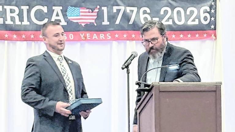 <b>Dr. Cory Homer receives the Chairman’s Award presented by past Chair, Mike Richards.</b>